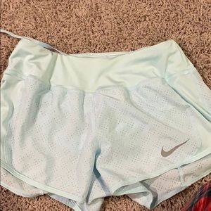 Barley worn Nike running shorts
